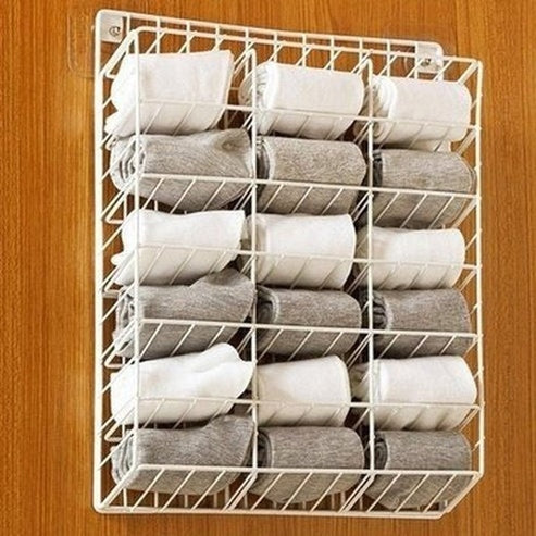 Iron Wall-Mounted Underwear and Socks Rack with Stickers, offering a High-capacity, Punch-Free Hanging. Storage and Organization. Type: Storage Hooks & Racks.