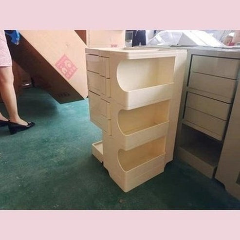 Indulge in the luxurious style of the Nordic Rotating Multilayer Bed Table, perfect for the small apartment. Decor. Furniture. Tables. Type: Nightstands.