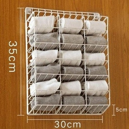 Iron Wall-Mounted Underwear and Socks Rack with Stickers, offering a High-capacity, Punch-Free Hanging. Storage and Organization. Type: Storage Hooks & Racks.