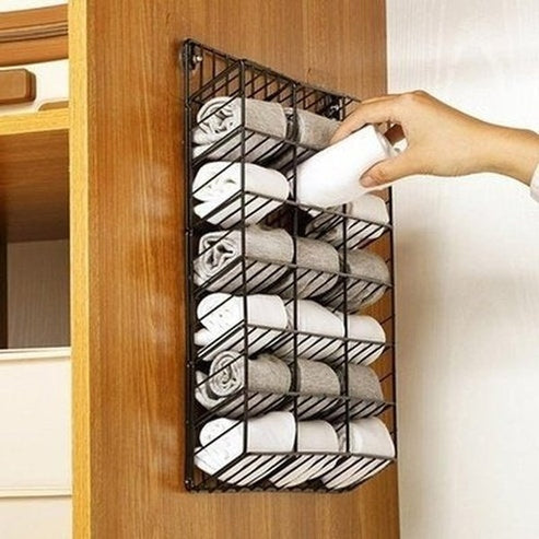 Iron Wall-Mounted Underwear and Socks Rack with Stickers, offering a High-capacity, Punch-Free Hanging. Storage and Organization. Type: Storage Hooks & Racks.