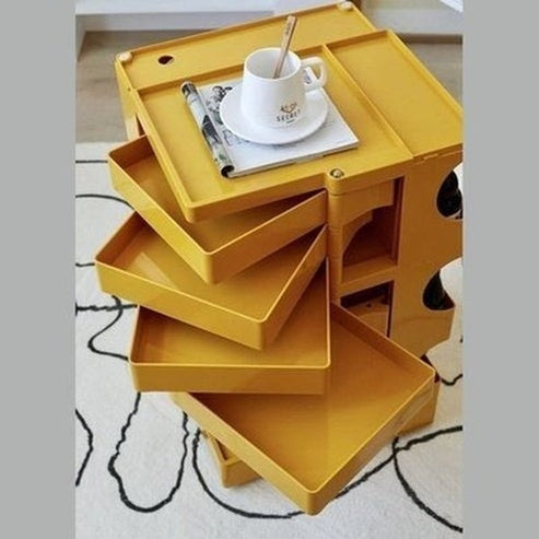 Indulge in the luxurious style of the Nordic Rotating Multilayer Bed Table, perfect for the small apartment. Decor. Furniture. Tables. Type: Nightstands.