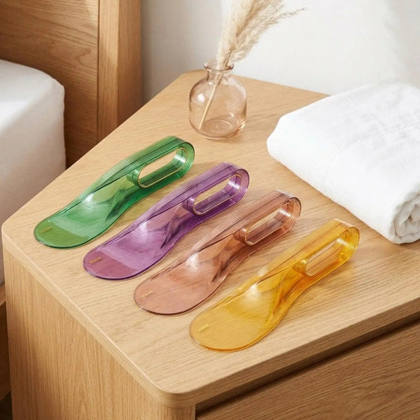 Curved mattress lifter with ergonomic handle