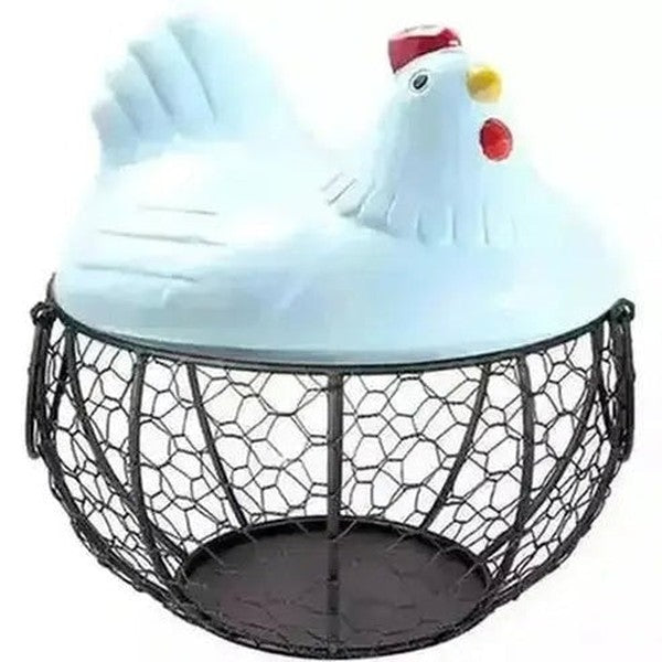 White ceramic hen egg basket with black wire base for farmhouse kitchen storage
