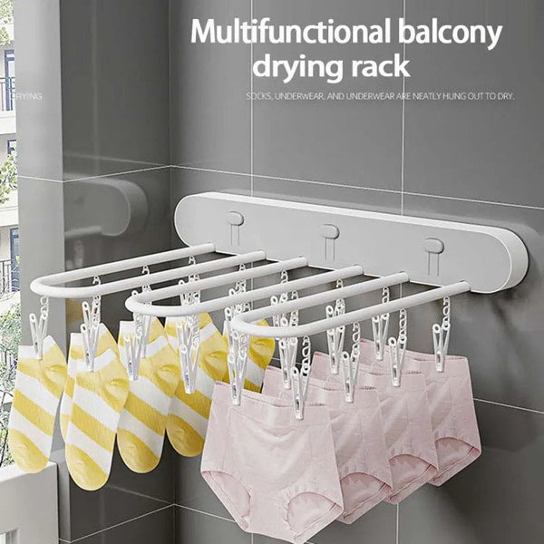 Space-saving wall-mounted clothes drying rack