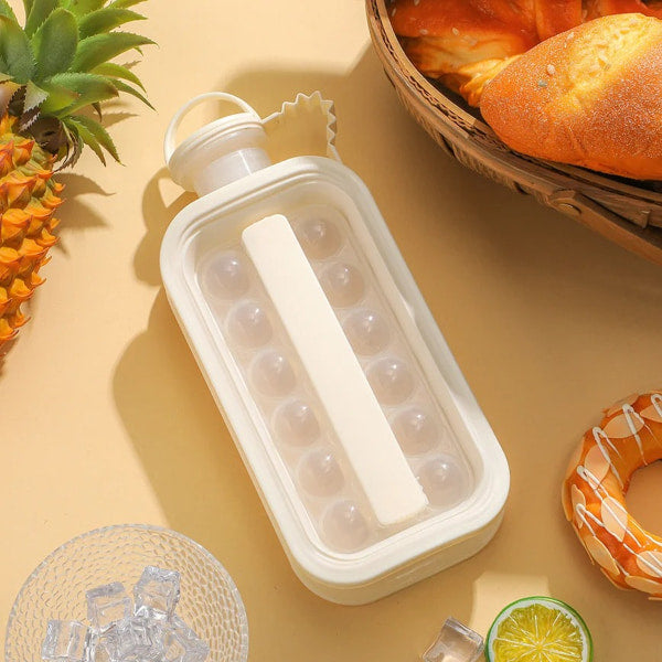 Compact ice cube maker bottle with carry handle