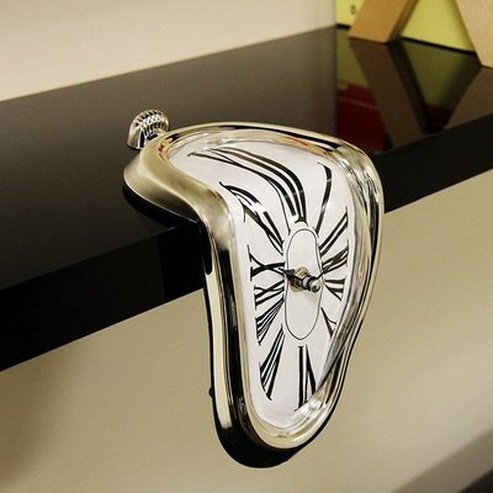 Inspired by famous Salvador Dalí painting "The Persistence of Memory" the Melting Clock was designed to be used on a shelf or hanging on your office desk.