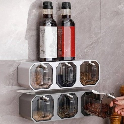 Elevate your culinary game with our 3-grid seasoning boxes set - wall-mounted, transparent, and drawer-designed for ultimate moisture protection: Spice Organizers.
