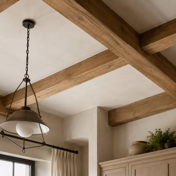 Farmhouse ceiling with exposed wooden beams and pendant lighting