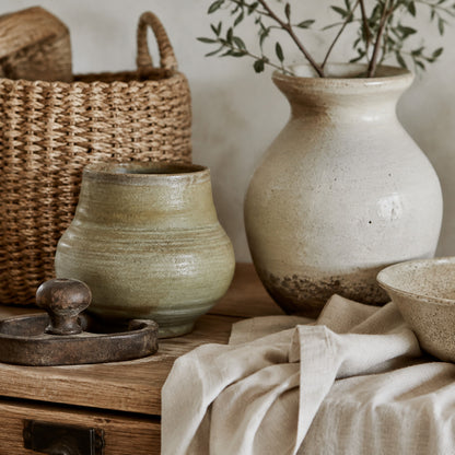 Farmhouse decor with ceramics linen and woven textures