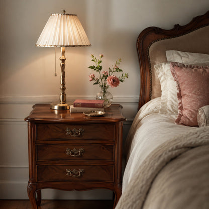Compact nightstand with wall light, charging tray and book