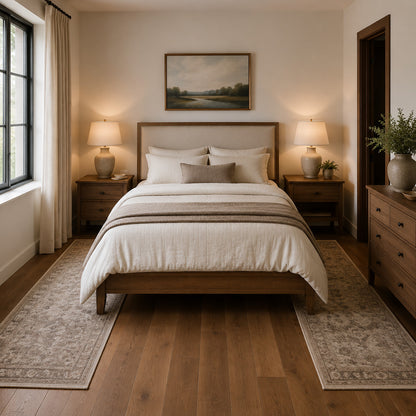 Matching runner rugs positioned beside a bed