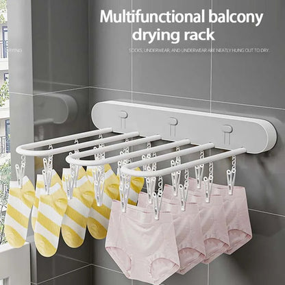 Space-saving wall-mounted clothes drying rack
