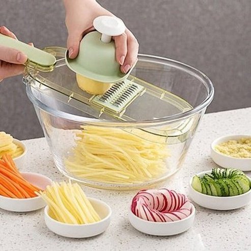 7 in 1 Vegetable Cutting Kitchen Slicers Green 7 in 1 Kitchen Vegetable Slicer Cutting · Dondepiso